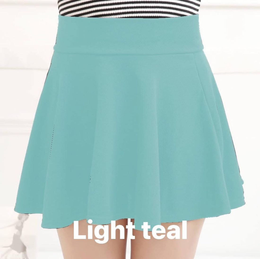 Solid teal skort w/ pockets